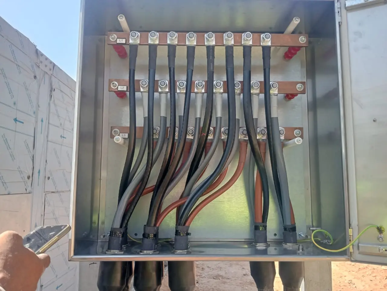 Terminated cables inside a stainless steel junction box