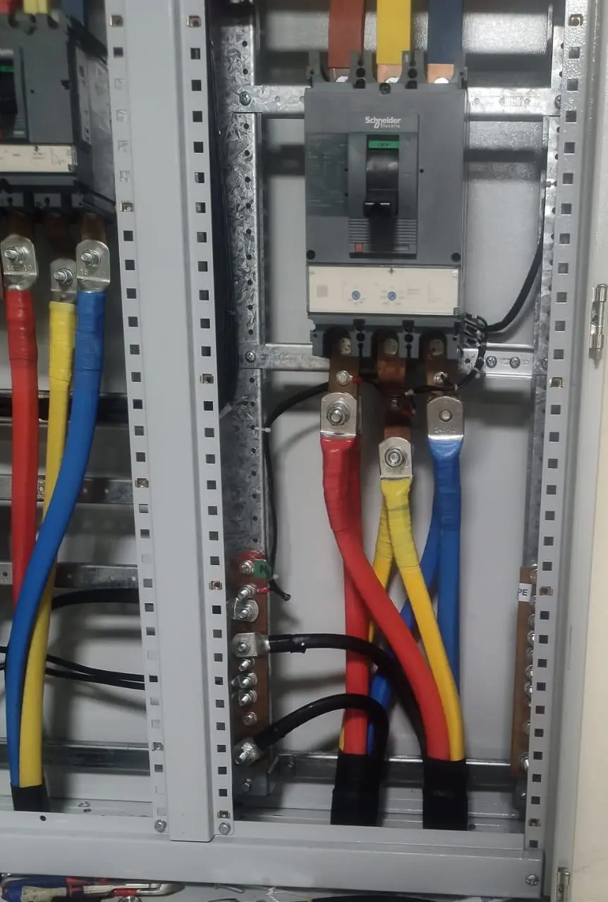 LV distribution panel with terminated power cables and breakers