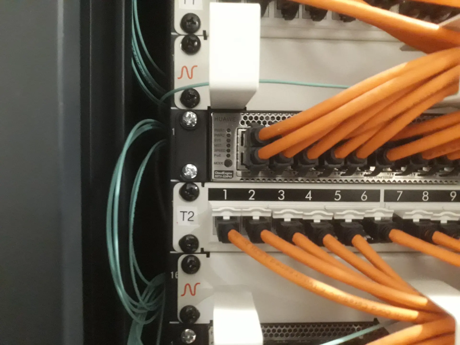 Data network rack with patch cables connected