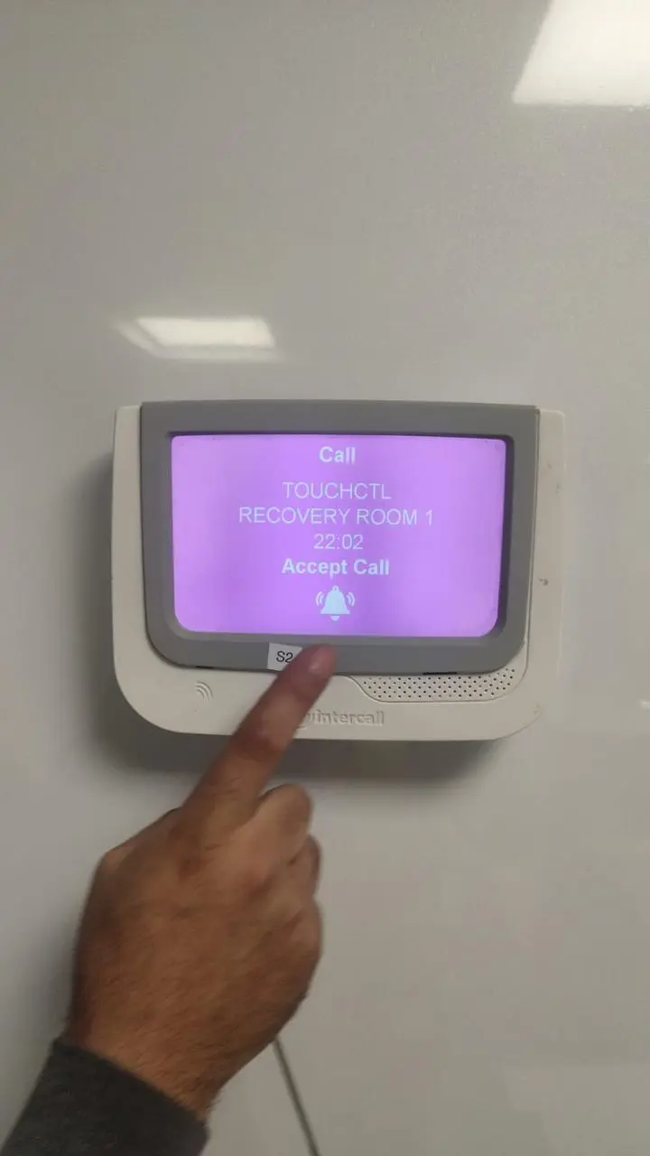 Nurse call panel being operated at a patient station