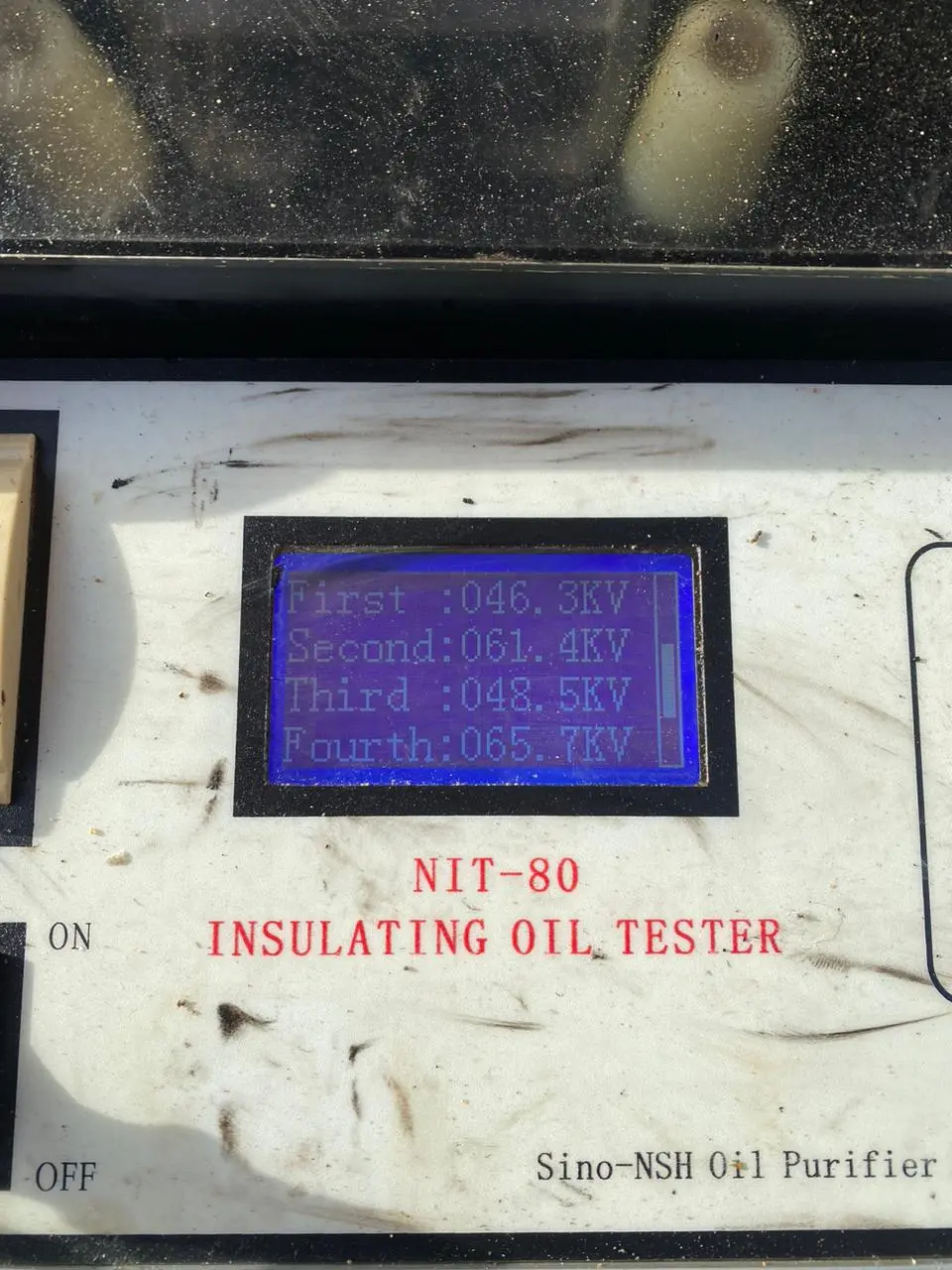 Insulating oil tester display showing test results